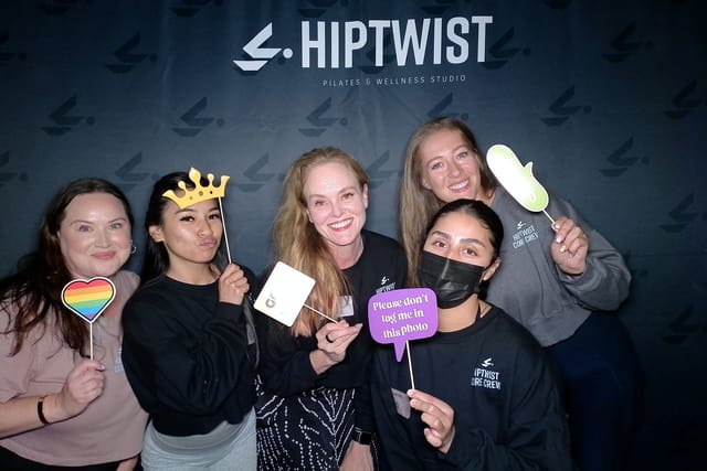 Sarah and the team with a &ldquo;Please don&rsquo;t tag me in this photo&rdquo; sign