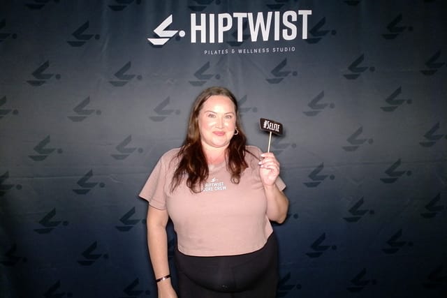 A guest with a #Selfie sign