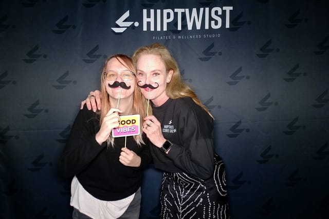 Sarah and a friend with mustache props